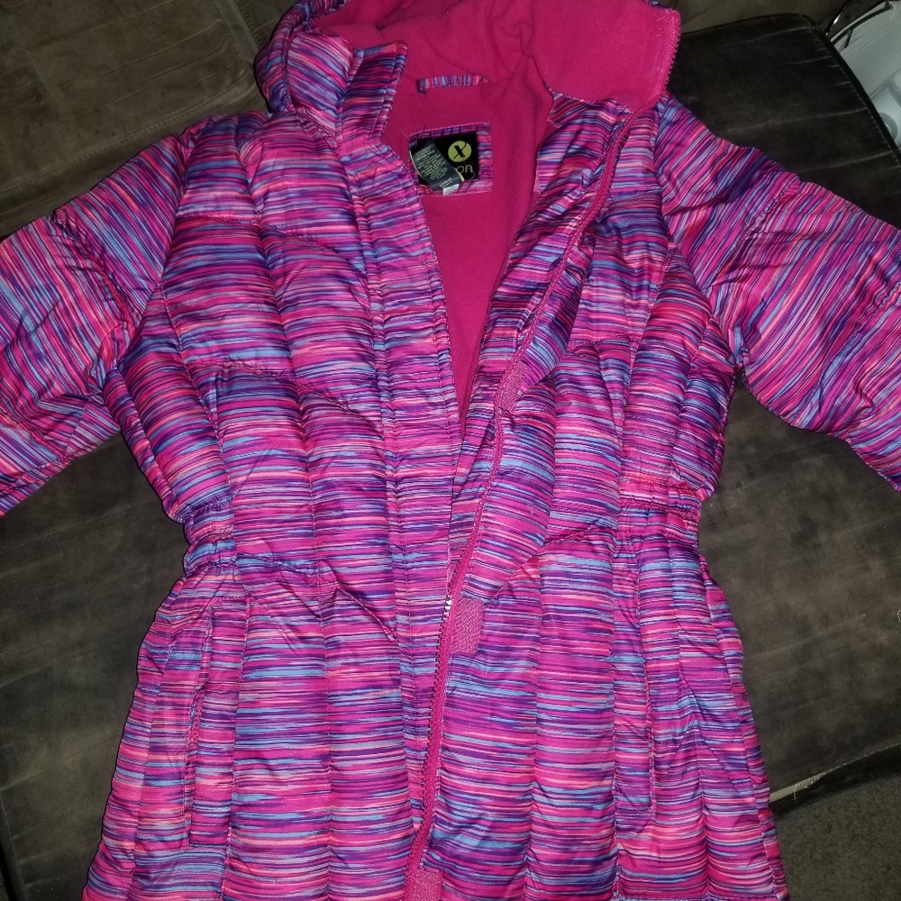 A girls size 14 winter coat with hood.